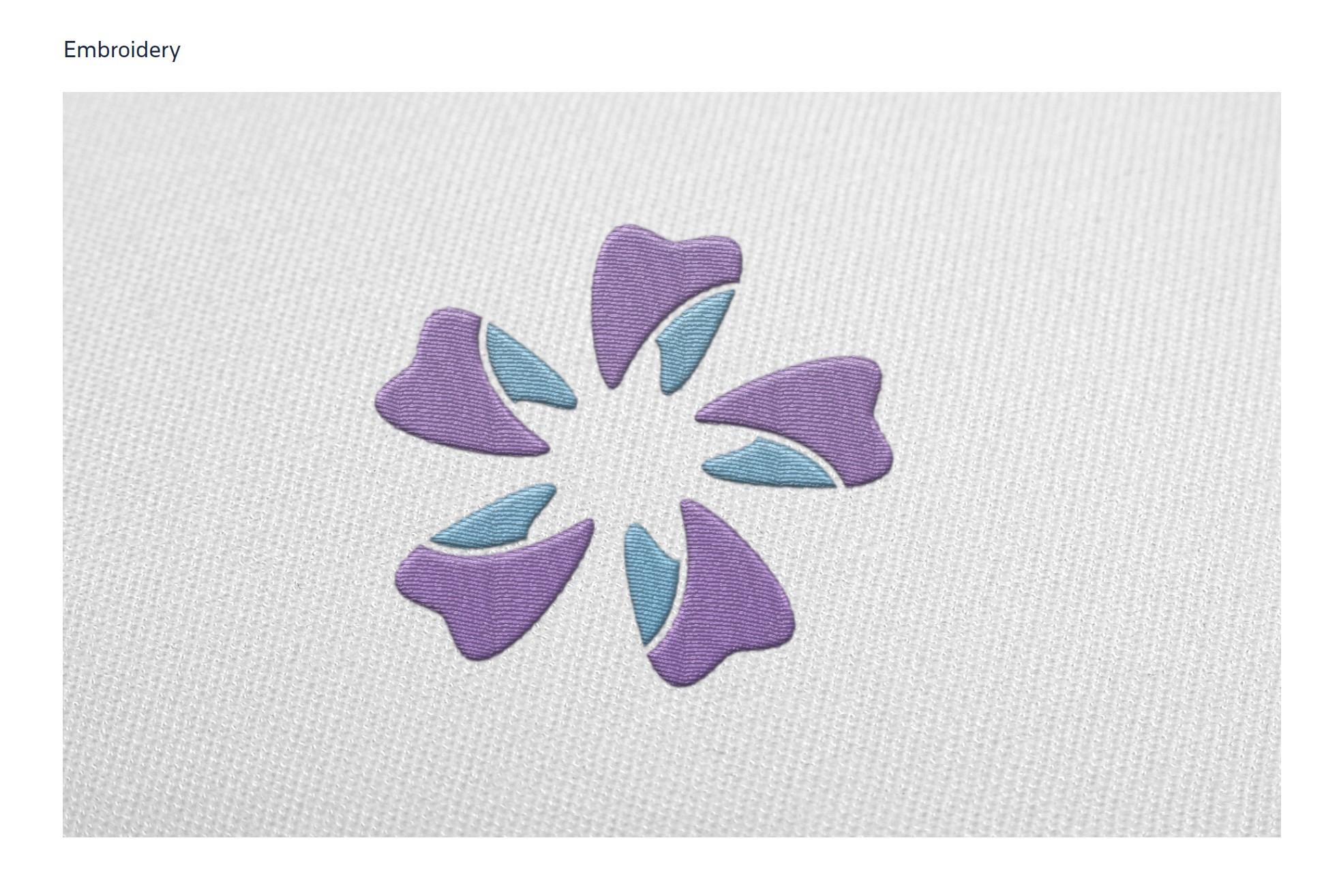 Haven Dental floral logo mark embroidered on fabric